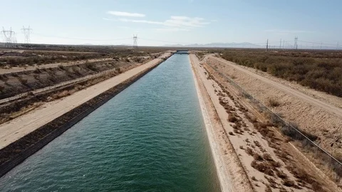 Aerial of Canal in Barren Desert Stock Footage
