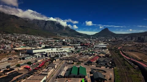 Aerial Cape Town skyline with Table Mountain under moving clouds Stock Footage 332299567
