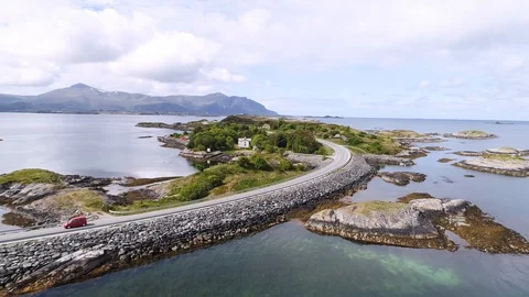 Aerial of car drive front view at atlantic Ocean Road Norway Stock Footage 100356845