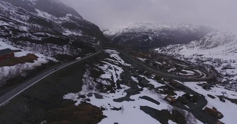 Aerial Of a Car going through Mountains Stock Footage 84688552