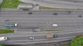 Aerial car traffic driving the busy city freeway, vertical shot HD Footage