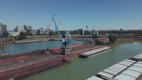 Aerial Cargo Crane and River Barges in Bratislava Port Stock Footage 340554389