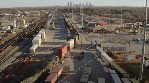 Aerial - cargo train enters intermodal freight terminal 스톡 동영상 146072785
