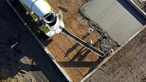 Aerial cement truck pour concrete for floor construction 4K Stock Footage