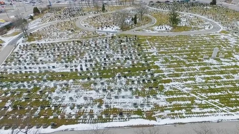 Aerial of a Cemetery in the winter Stock Footage 103515298