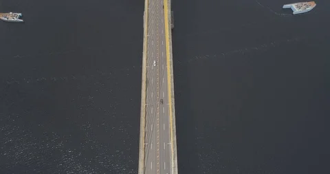 Aerial centralized view looking down on the cable-stayed Rio Negro Bridge that Stock Footage 101293596