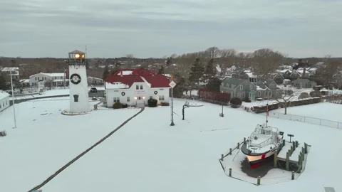 Aerial of Chatham, Cape Cod Lighthouse at Winter with Snow 動画素材 325748604