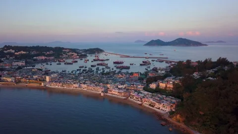 Aerial Cheung Chau Island, Hong Kong sunrise during Bun Festival Stock Footage