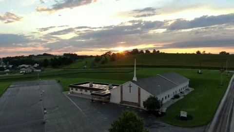 https://images.pond5.com/aerial-christian-evangelical-church-steeple-footage-138056188_iconl.jpeg