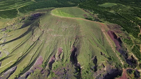 Aerial Cinder Cone Volcano Slopes Dramatic Shadows 4K HLG Stock Footage 344007312