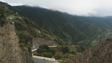 Aerial. A cinematic flight of a drone through a crevice high in the mountains - Stock Footage 111308627