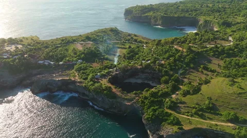 Aerial Cinematic Flight Over Broken Beach Arch Coastline Indonesia Видео 340480479