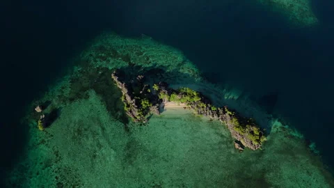Aerial Cinematic Flight Over Remote Uninhabited Island Raja Ampat 動画素材 337797024