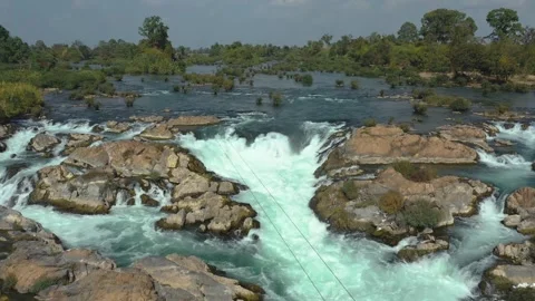 Aerial cinematic travelling of Li Phi Somphamit Waterfalls, Mekong, Laos. Stock Footage 246830751