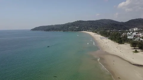 Aerial Cinematic view (camera forward): Tropical turquoise sea and long beach Stock Footage 71969417