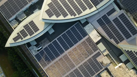 Aerial cinematic view of a solar panel on building rooftop Stock Footage 169861974