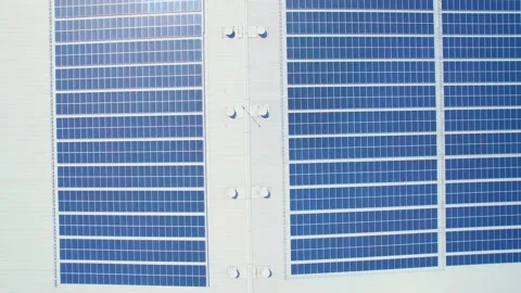 Aerial cinematic view of a solar panel on mall roof top Stock Footage 201052031