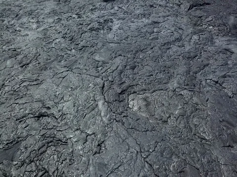 Aerial circle black lava flow Big Island Hawaii 4K Stock Footage 81020957