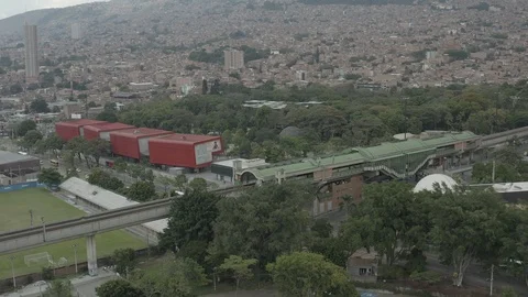 Aerial circles around Parque Explora and the Universidades metro station Stock-Footage 105719547