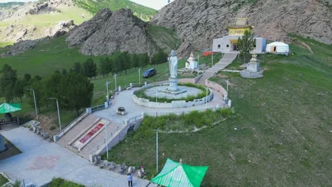 Aerial circles stone Buddha statue at Galdan Zuu Temple in Mongolia Stock Footage 345418737
