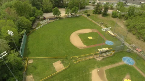Aerial Circling Around Baseball Fields in Small American Town Video stock 154610177