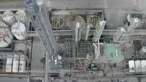 Aerial circling top-down view of factory processing unit, France Stock Footage 310190845