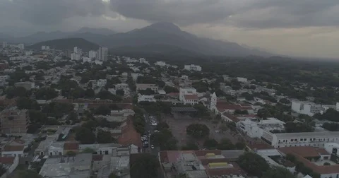 Aerial circling the Valledupar plaza with the Sierra Nevadas in the background Stock Footage
