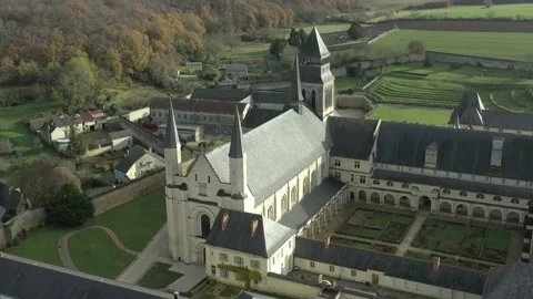 Aerial circular view of abbey chirch of Fontevraud Stock Footage 222996157