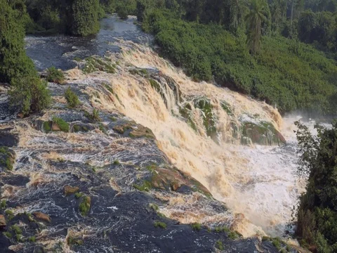 Aerial circular view focus on slide smooth waterfall in jungle gabon 2015 Stock Footage 82354872