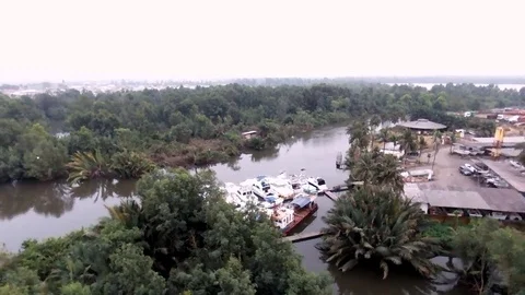 Aerial circular view of Wouri river, boats Stock Footage 80584438