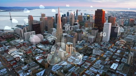 Aerial city connected through 5G. Wireless network, mobile technology concept. Stock Footage
