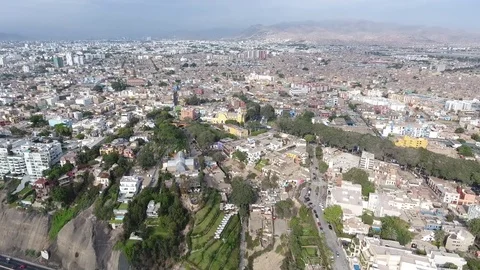Aerial of City of Lima above pan left Stock Footage