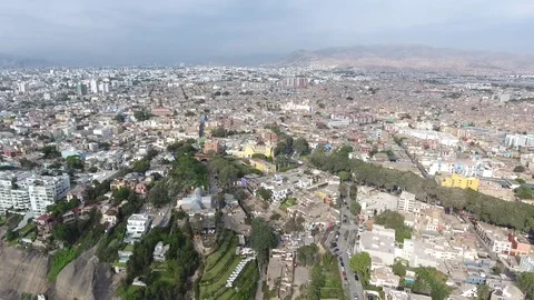 Aerial of City of Lima above slight pivot Stock Footage