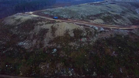 Aerial City Trash Garbage Dump. Trucks. Video stock 143356023