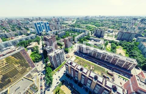 Aerial city view. Urban landscape. Copter shot. Panoramic image Stock Photos