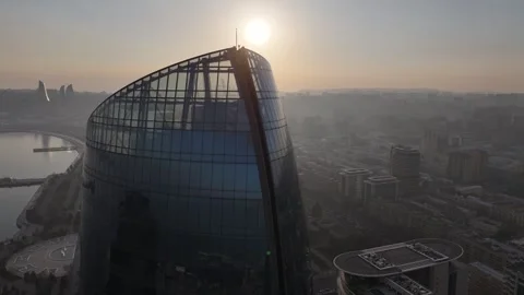 Aerial Cityscape at Sunset with Modern Skyscraper Stock Footage 341905071