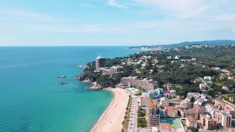 Aerial cityscape view of beach and Mediterranean Sea along Costa Brava in P.. Stock-Footage 245990669