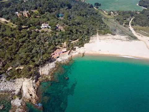 Aerial cityscape view of beach and Mediterranean Sea along Costa Brava in P.. Stock Photos