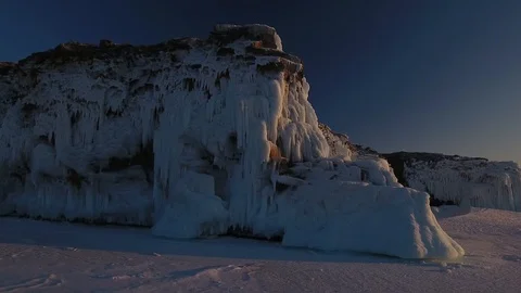 Aerial cliffs unique splashes white ice lake Baikal coastal Winter Sunset Russia Stock Footage 88167051