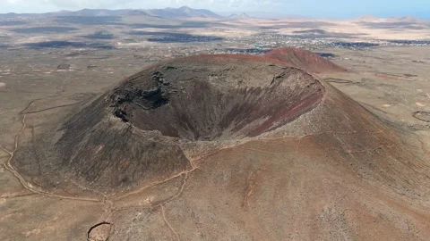 Aerial clip of the dramatic Volcan Calderon Hondo volcano Fuerteventura Stock Footage 277118026