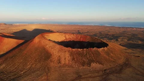 Aerial clip of the dramatic Volcan Calderon Hondo volcano Fuerteventura Stock Footage 277118166