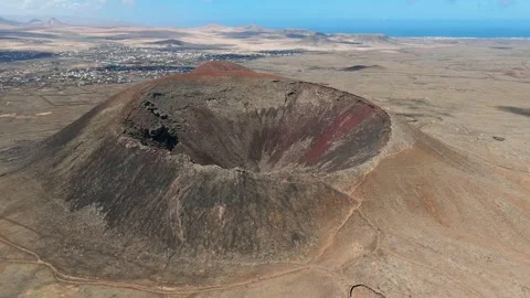 Aerial clip of the dramatic Volcan Calderon Hondo volcano Fuerteventura Stock Footage 277118201