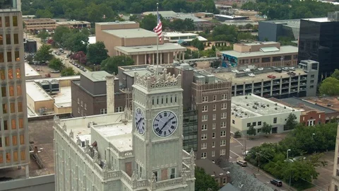Aerial: Clock tower in downtown Jackson, Mississippi, USA Stock Footage 125730454