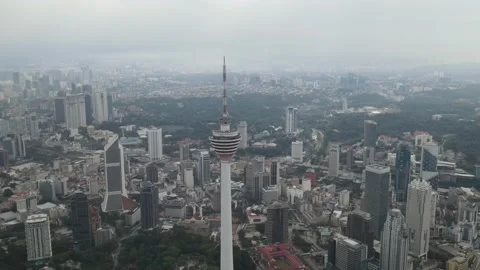 Aerial clock view of communications tower in Kuala Lumpur Stock Footage 150290027