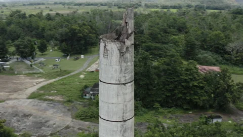 Aerial close-up of the chimney stack at an old abandoned factory in Puerto Video stock 159203569