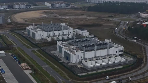 Aerial close-up drone video of Vantage Data Centers Berlin 01, highlighting Stock Footage 325834361