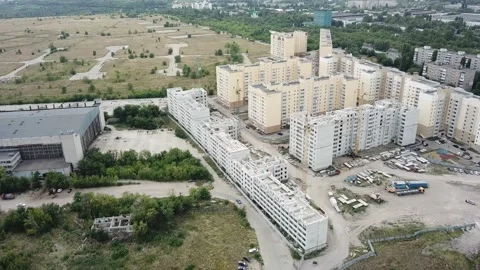 Aerial close in front of windows modern dormitory area houses buildings Stock Footage 136962272