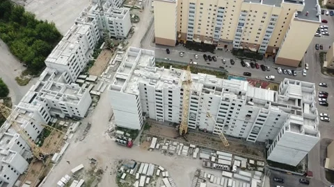 Aerial close in front of windows modern dormitory area houses buildings Stock Footage 136962440
