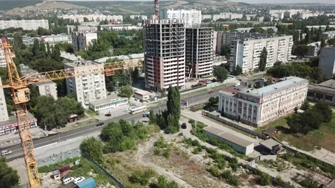 Aerial close in front of windows modern dormitory area houses buildings Stock Footage 136964419