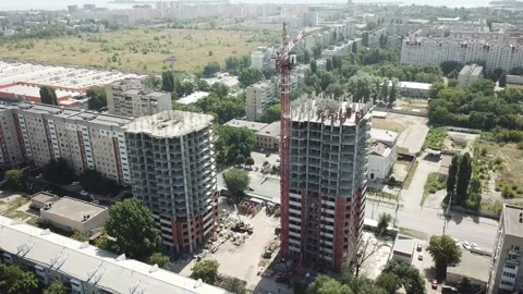 Aerial close in front of windows modern dormitory area houses buildings Stock Footage 136964715